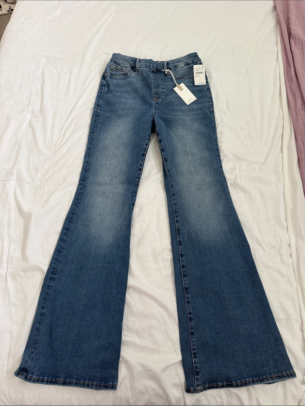 Good American Pull On Power Flare - medium wash, high rise